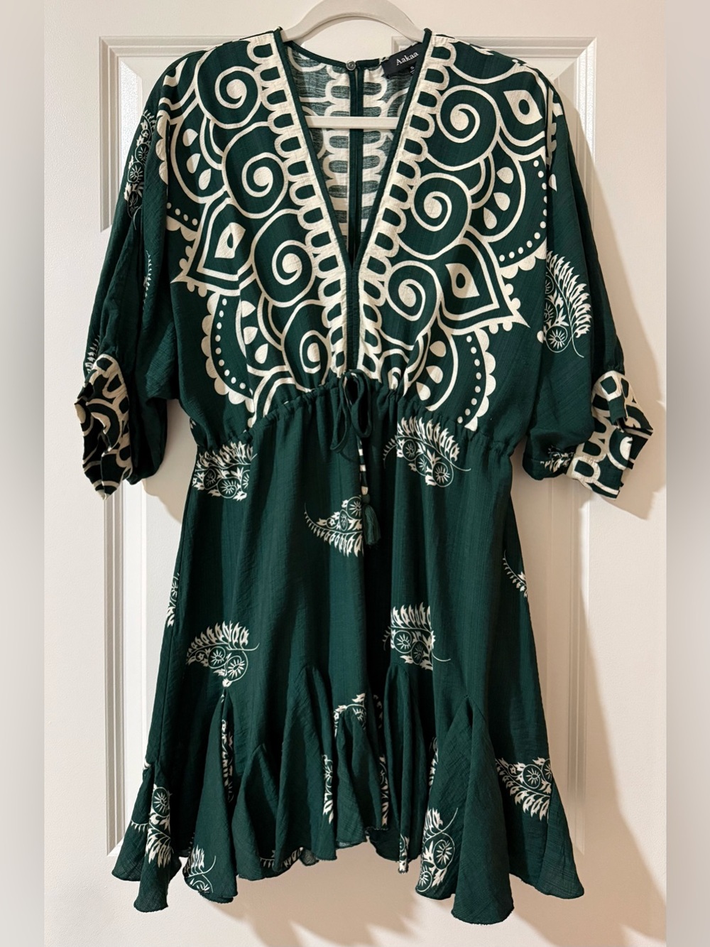 VICI Collection: Aakaa Salty Petals Tassel Tie Mini Dress